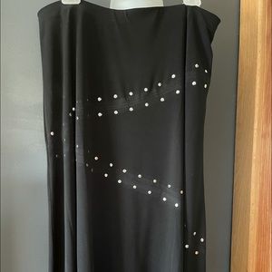 Beautiful black skirt with silver grommets